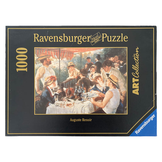 Photo of box of Luncheon of the Boating Party Puzzle with art by Auguste Renoir.