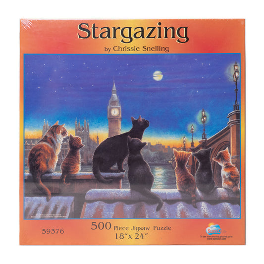 Photo of box of Stargazing Sunsout puzzle.  Cats looking a the moon with Big Ben in the background.